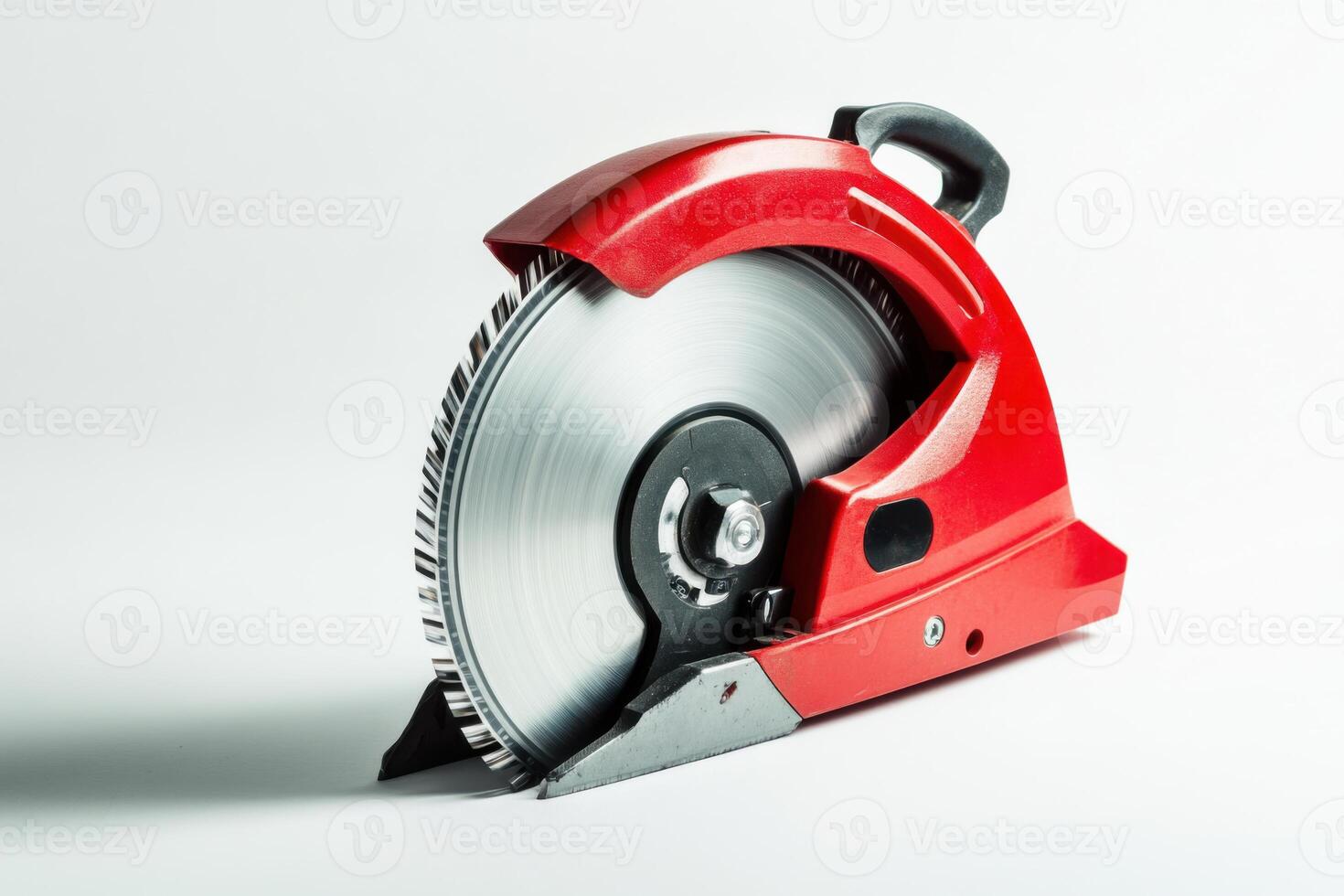 A red circular saw on a white background photo