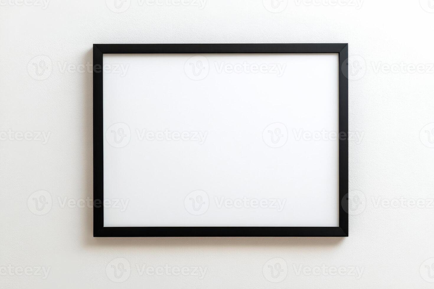 Elegant black canvas frame enhancing modern minimalism in a serene indoor space with a bright white wall photo