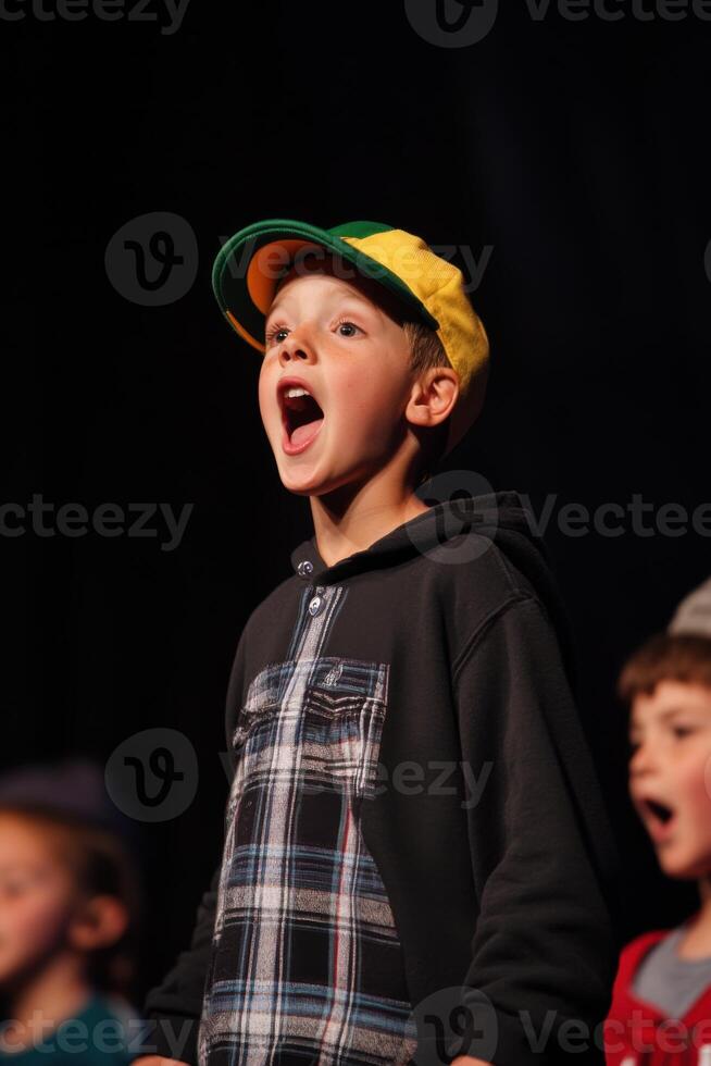 Exciting kids showcase wacky talent acts during fun-filled talent show performance photo