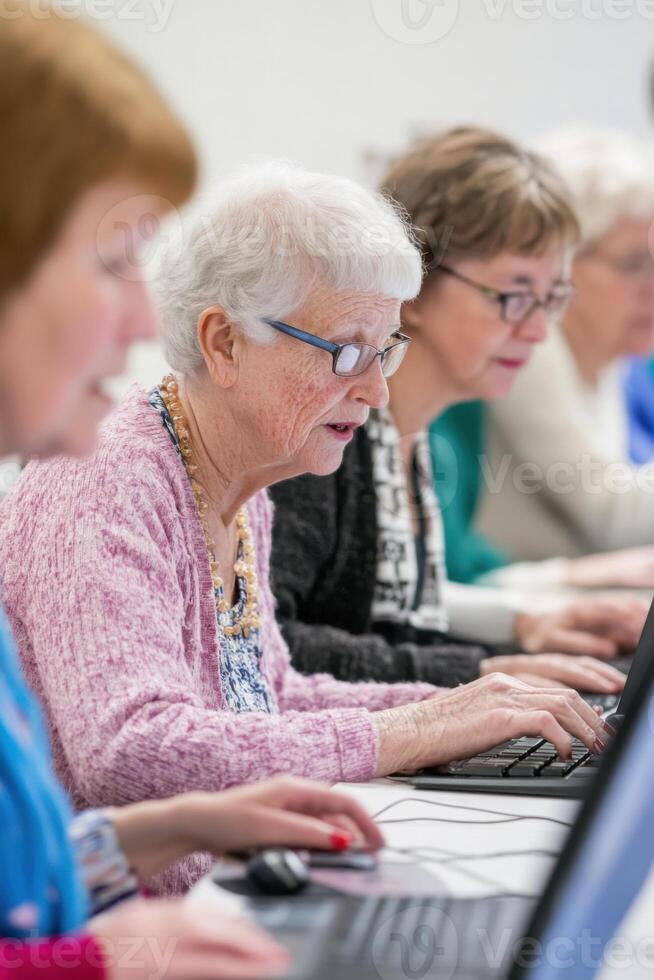 Elderly participants engage in a friendly computer workshop for technology learning photo