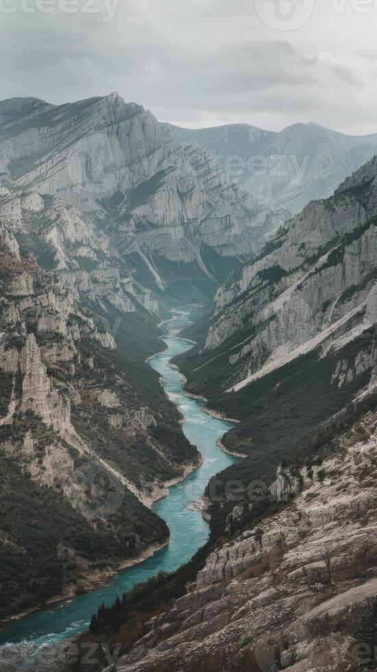 A river runs through a mountain valley photo