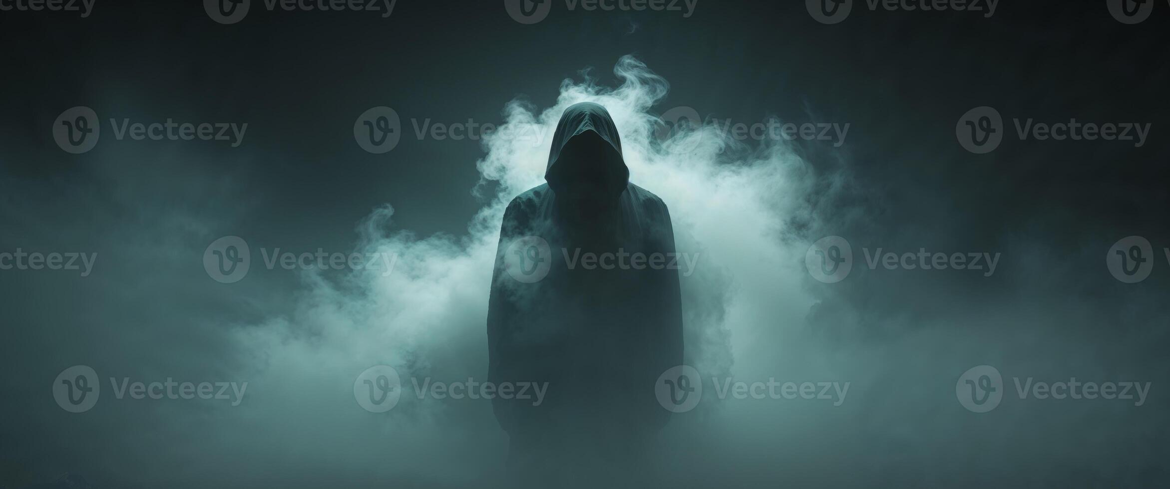 Mysterious Figure Enshrouded in Mist with Eerie Glow in a Dark Moody Atmospheric Setting photo
