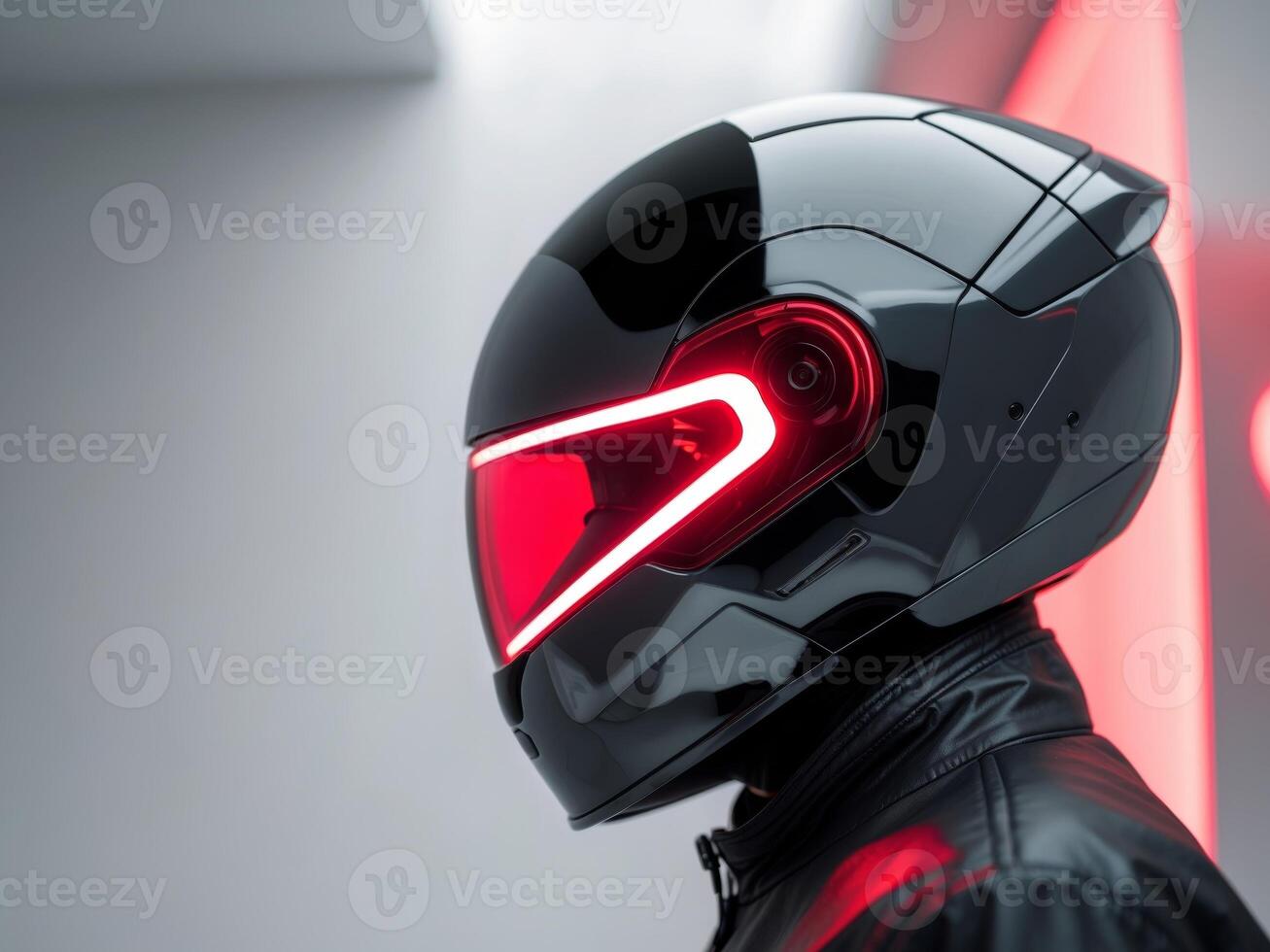 Futuristic helmet with red light on reflective surface. photo
