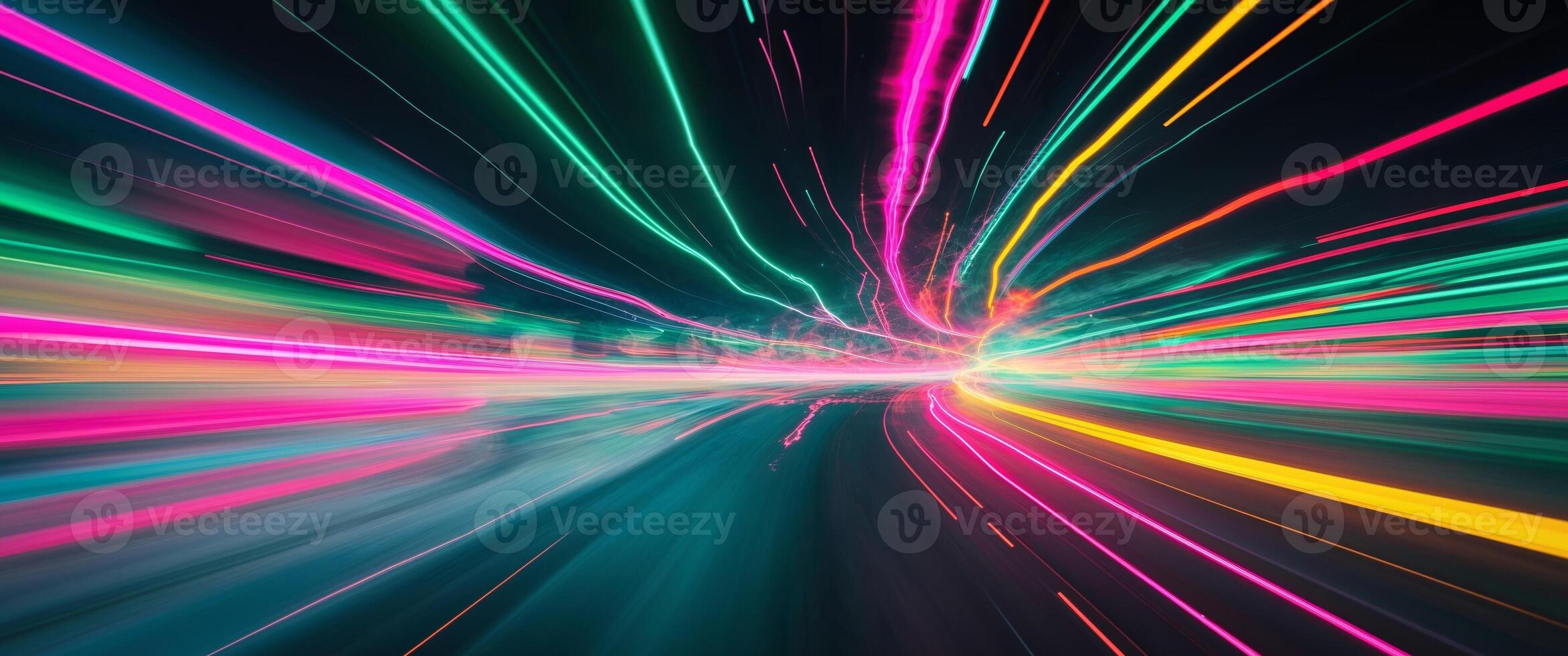 Vivid neon light streaks in motion on dark background photo