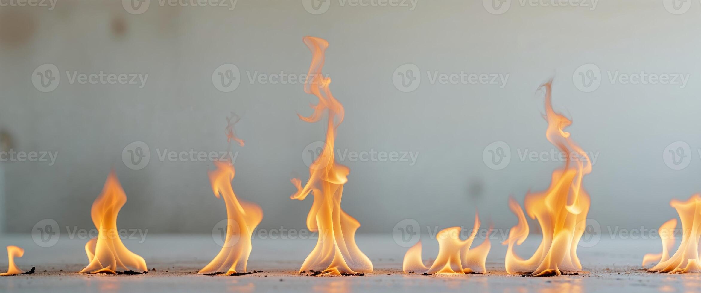 genuine flames arranged separately on a light background photo