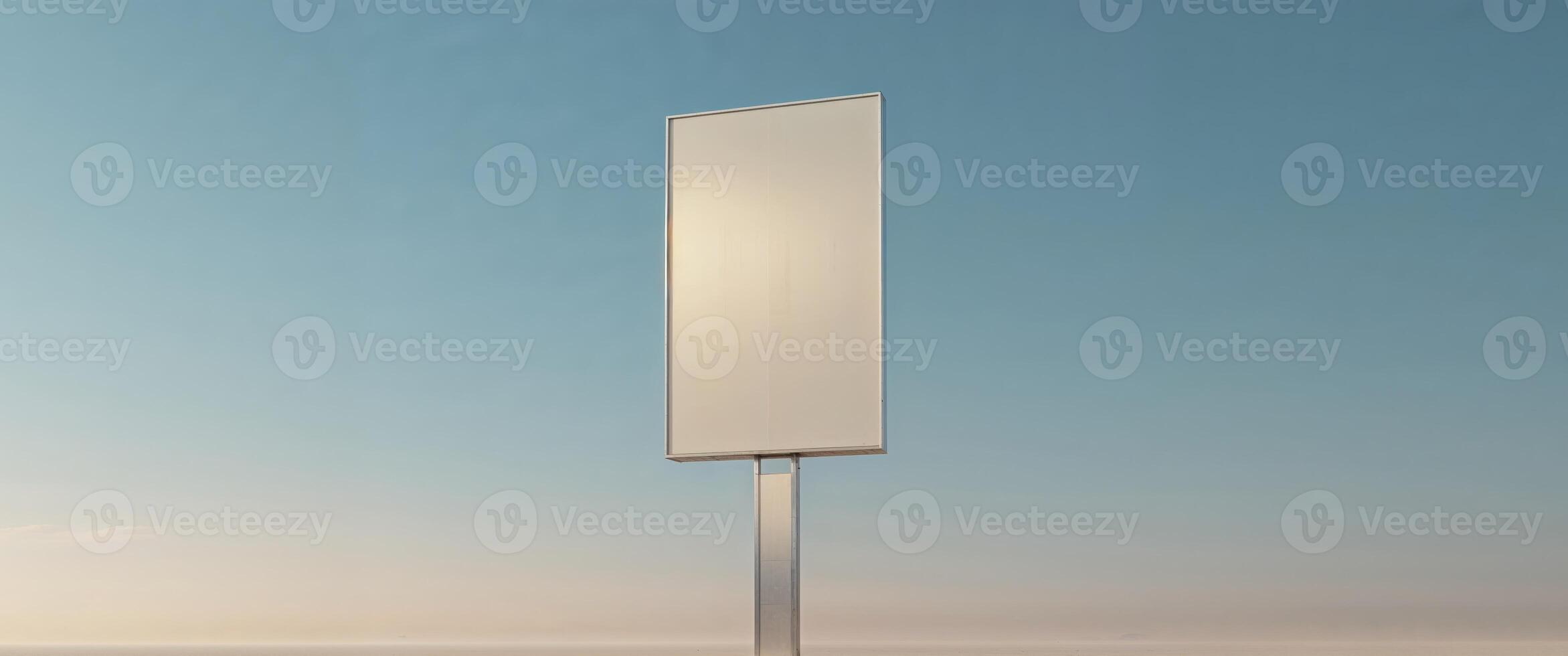Blank billboard on the street with a blue sky photo