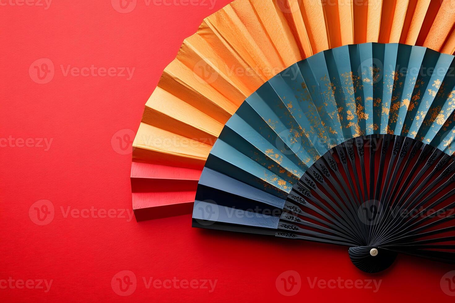 Elegant Decorative Fan on Vibrant Red Background for Asian-Inspired Design photo