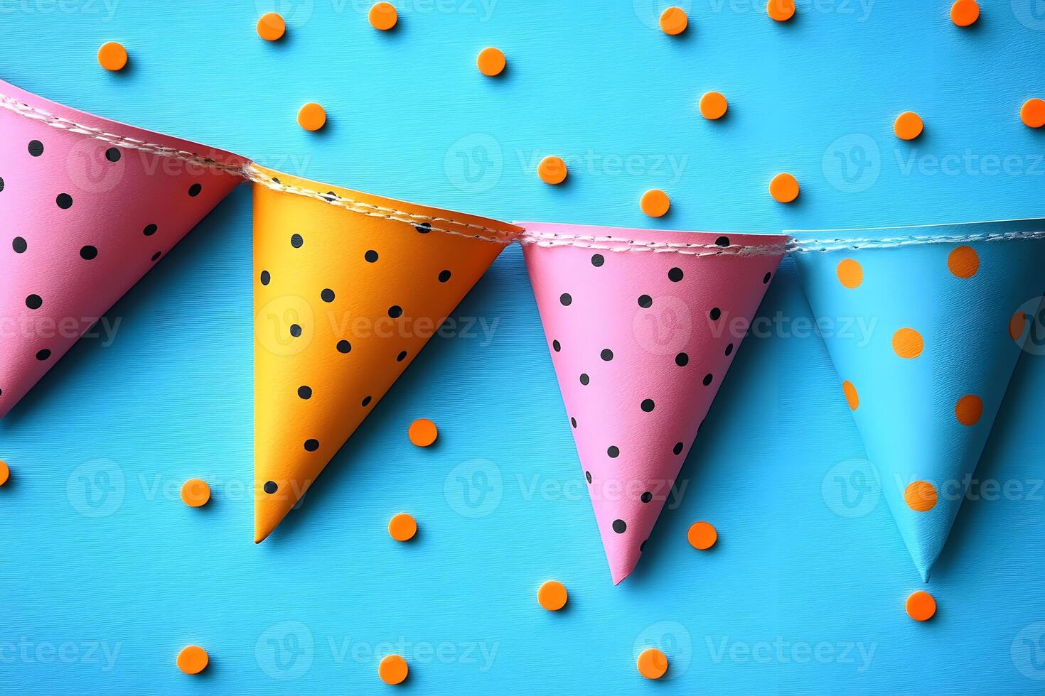 Colorful Polka Dot Party Bunting on Blue Background for Celebration Decor Design photo
