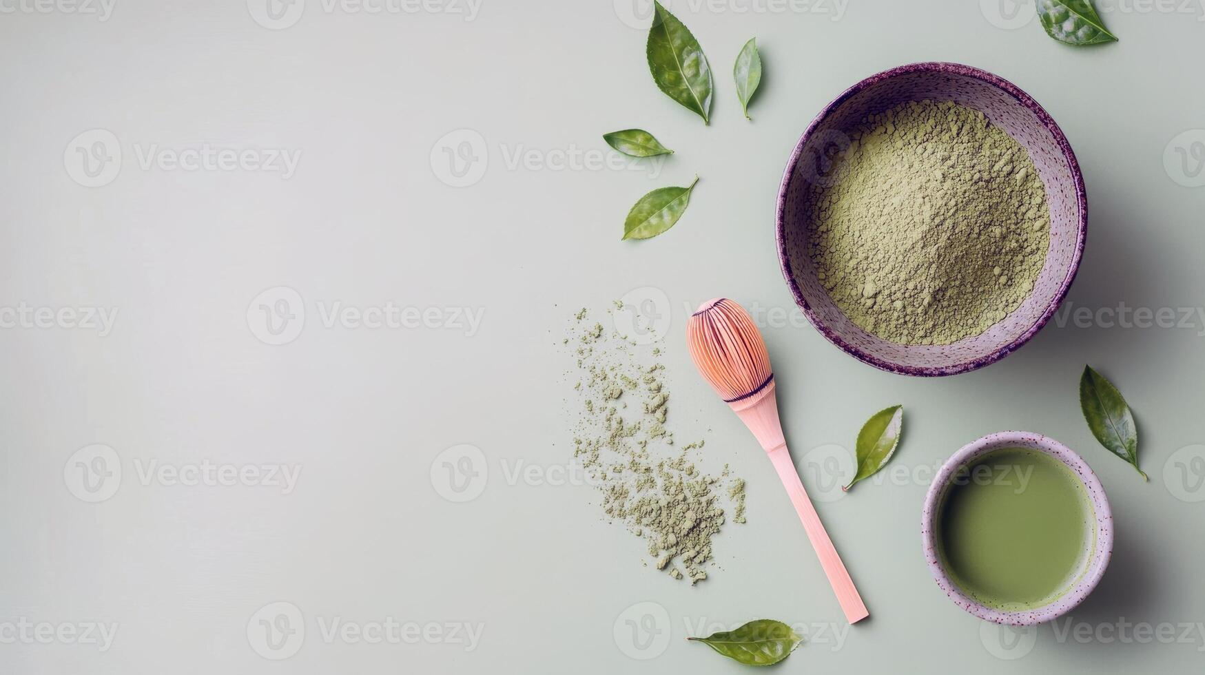 Matcha ceremony essentials with bamboo whisk and fresh green leaves photo