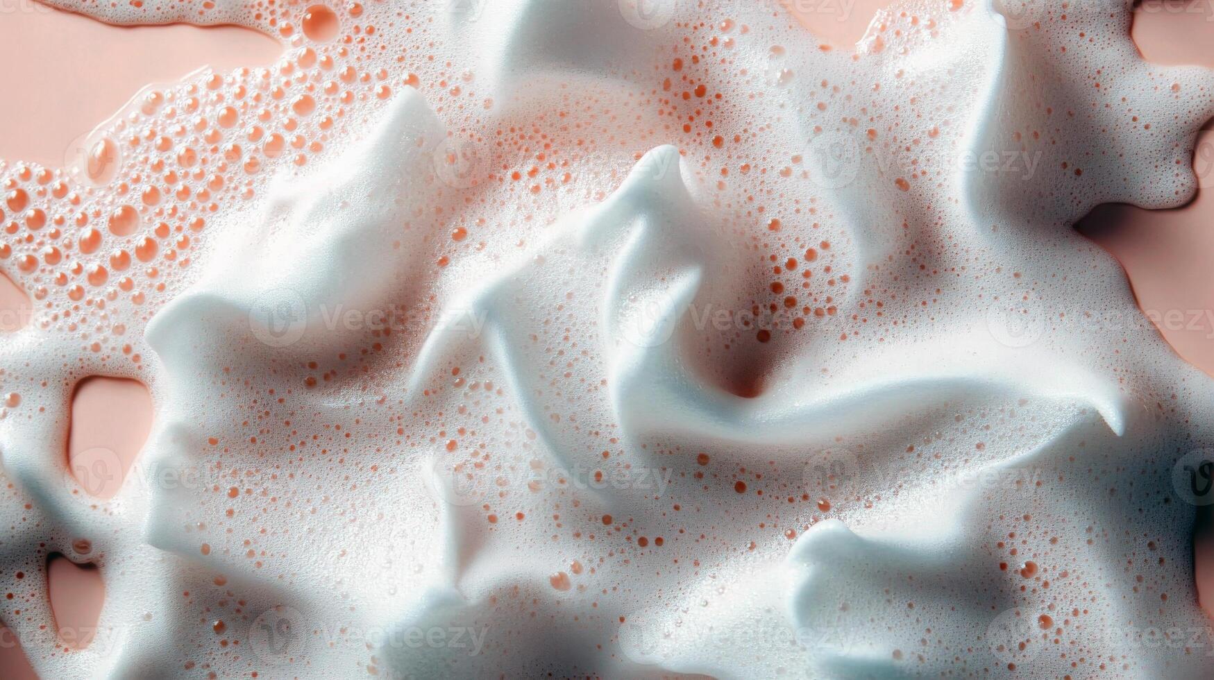 Close-up of pink and white foamy texture with bubbles photo
