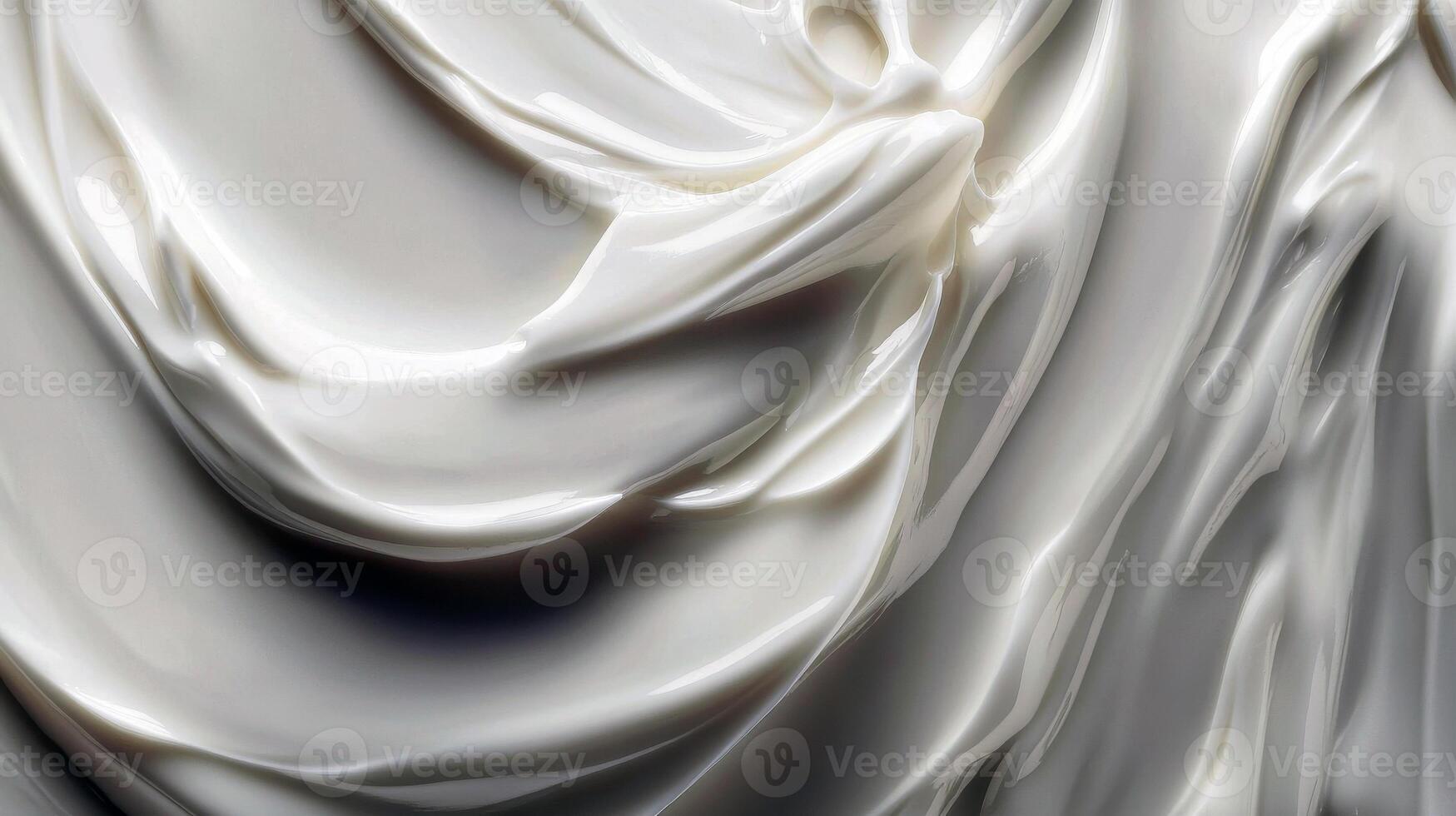 Close-up of smooth creamy texture swirls in white beige color photo