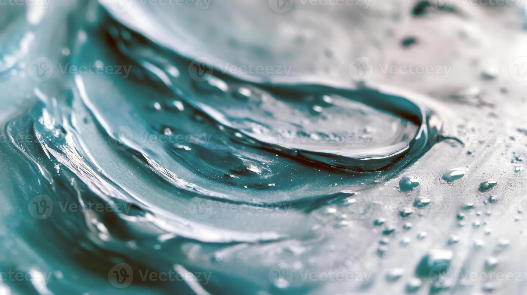 Close-up of textured blue gel with water droplets photo