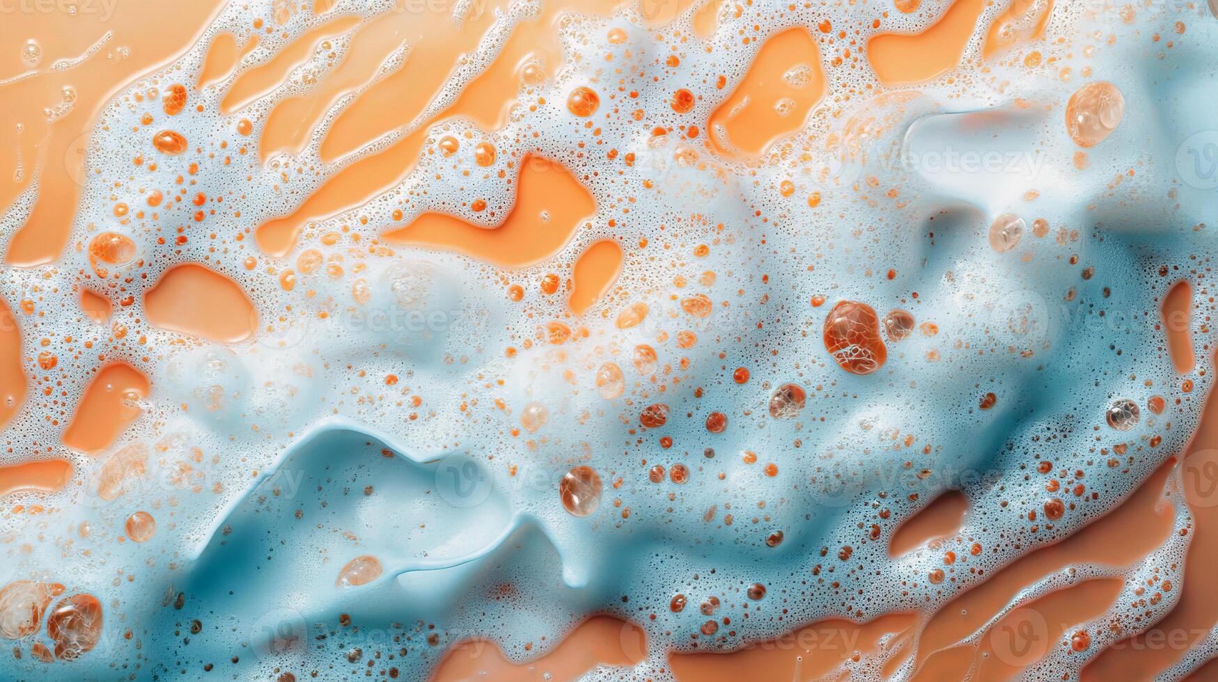 Close-up of soapy bubbles on smooth orange surface photo