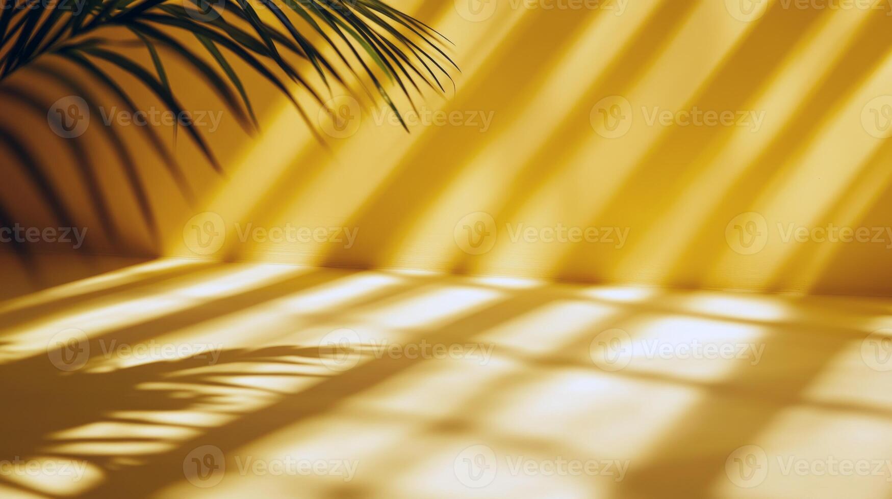 Sunlit palm shadows cast on bright yellow wall creating tropical atmosphere photo