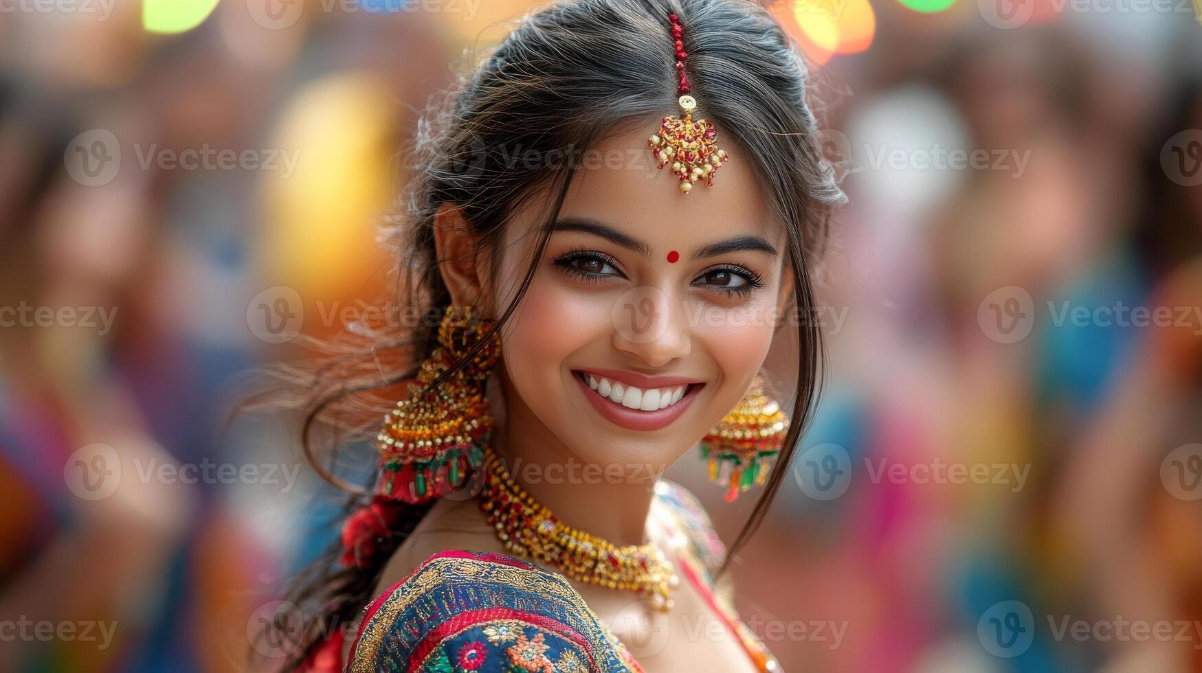 Joyful young asian female in traditional indian attire at festive celebration photo