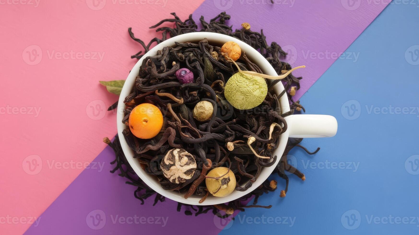 A cup of tea with various fruits and nuts photo