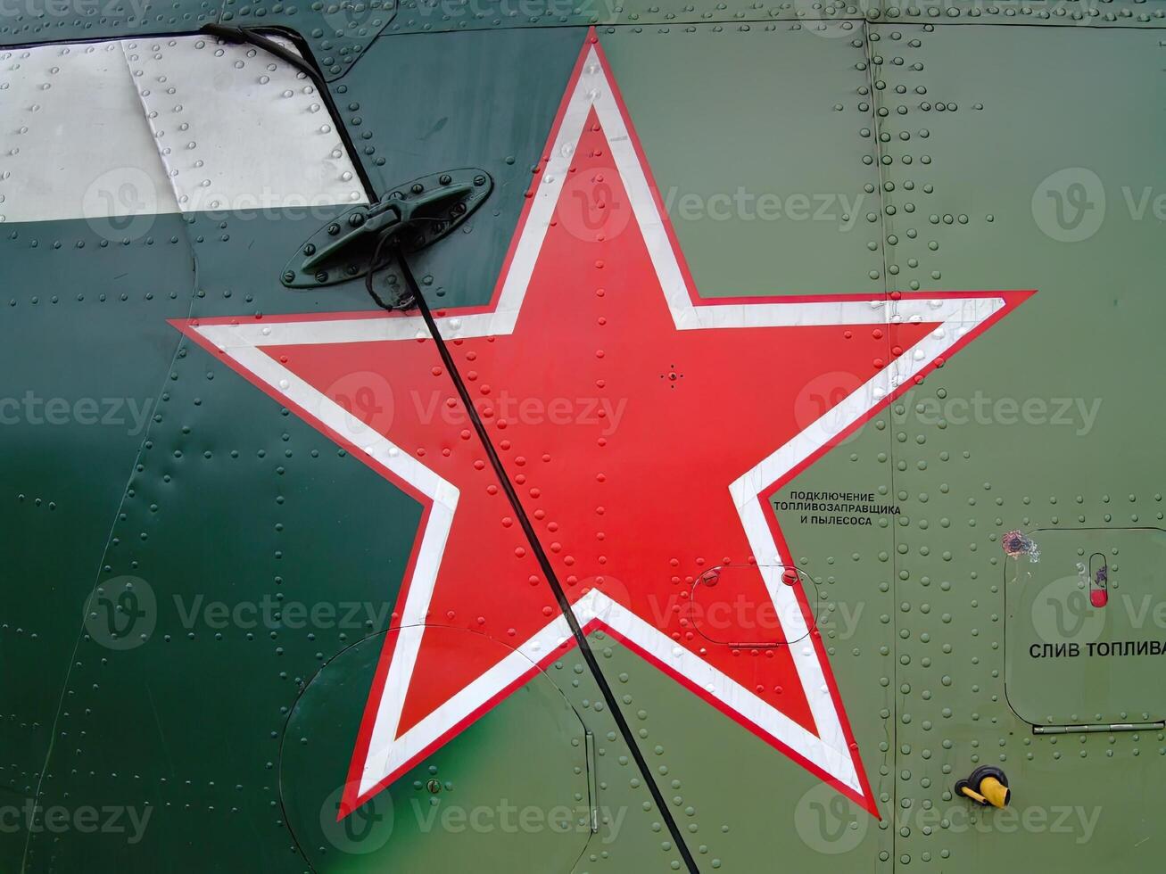 Red star emblem displayed on military aircraft at an aviation exhibition event in a city photo