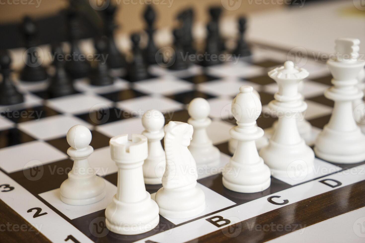 Chess pawns on the chessboard. photo