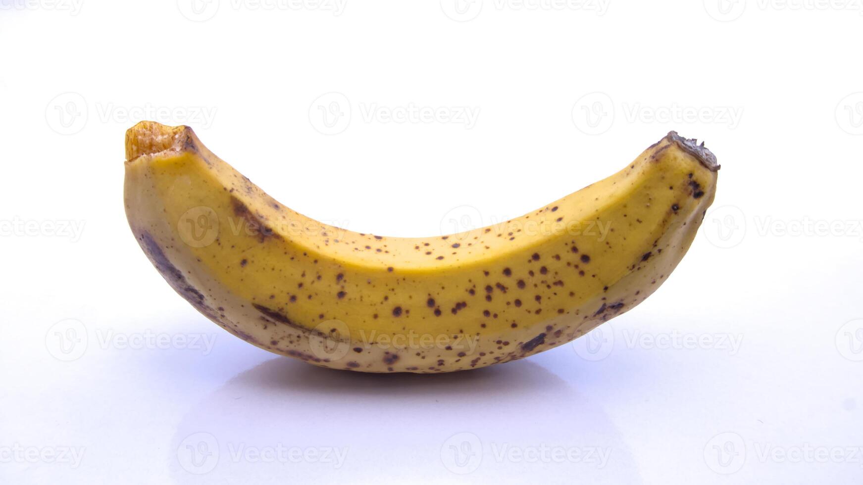 Ripe Spotted Banana, Close-Up Isolated on White Background photo