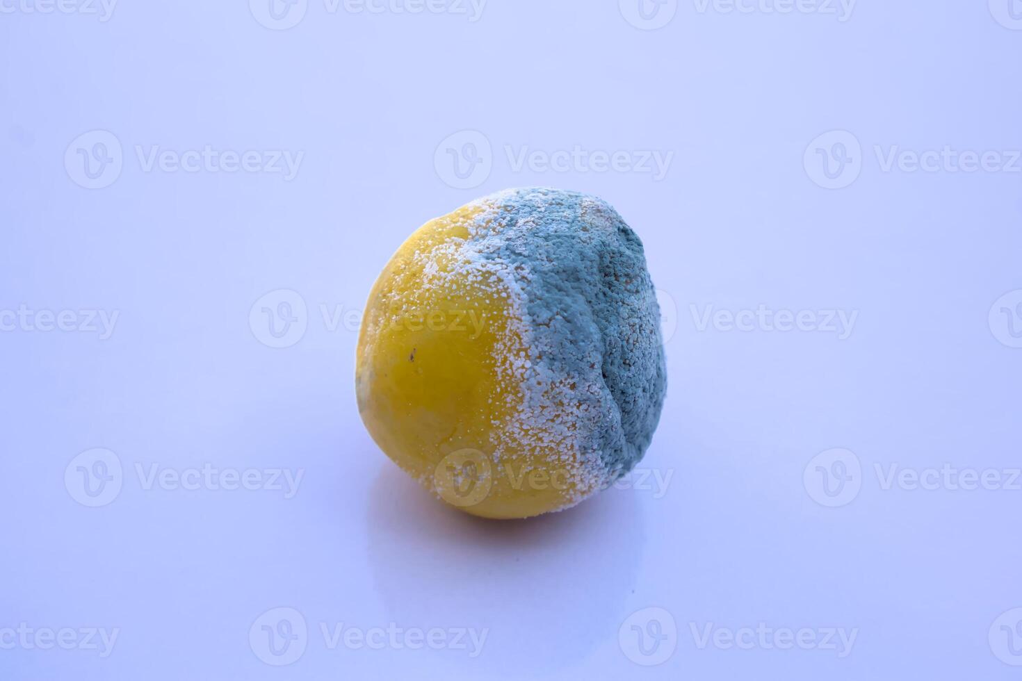 Rotten Lemon with Mold - Isolated White Background, Close-Up photo