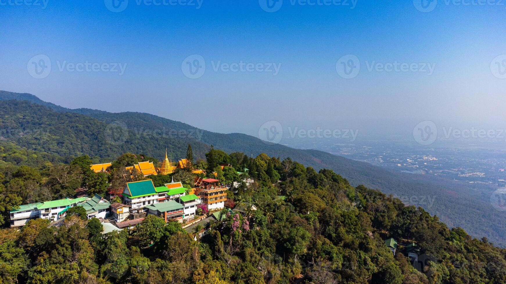 Wat Phra That Doi Suthep temple shining on mountain top in Chiang Mai in Thailand in the morning photo