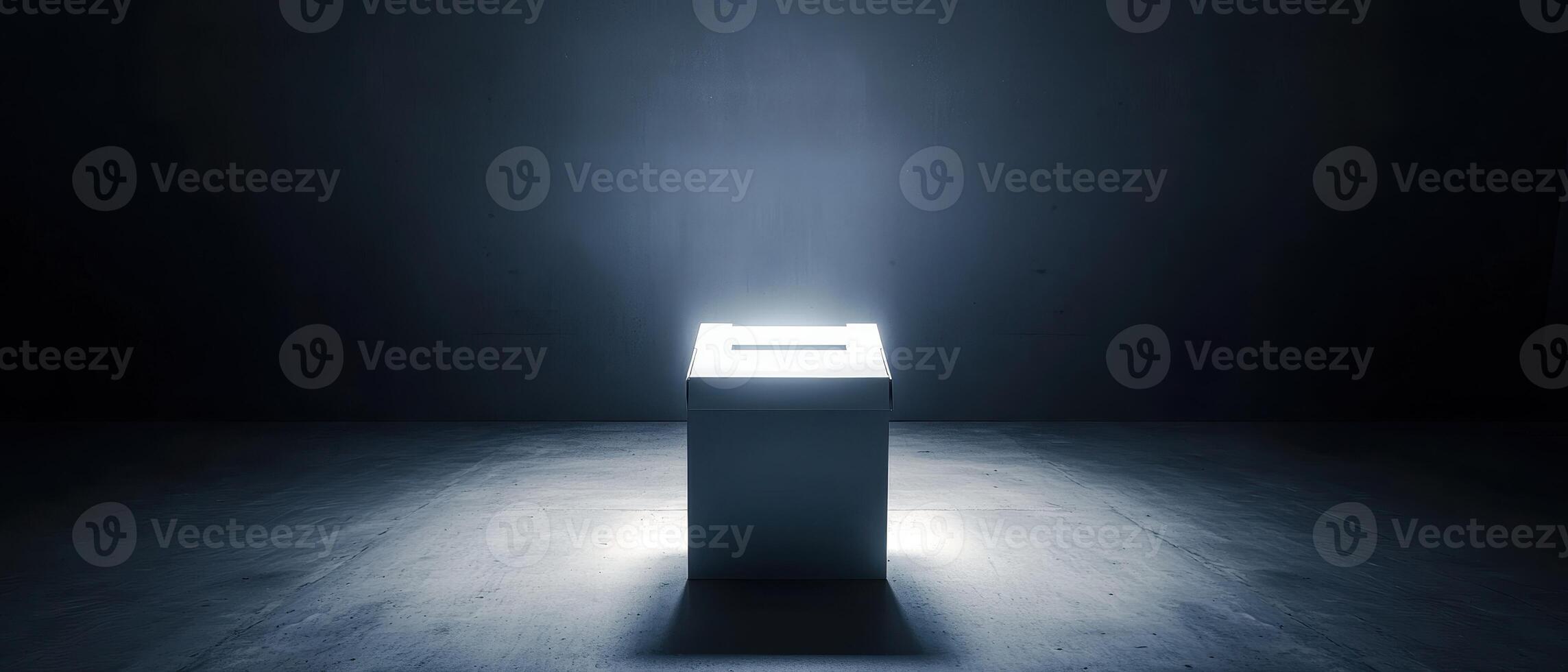 A mysterious illuminated box sits in darkness, casting a soft glow around it. photo