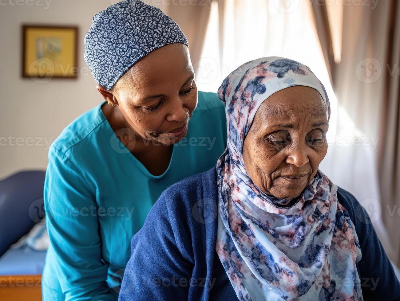 A caregiver gently assists an elderly woman in a cozy indoor setting, highlighting compassion and connection. photo