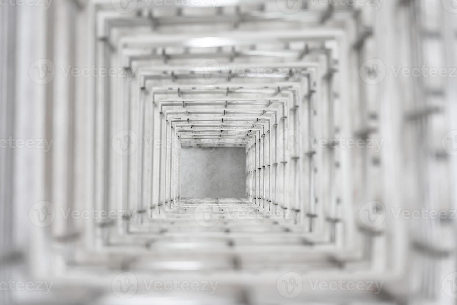 Top angle view of the white reinforced steel bar fram ework column construction in the work site. photo