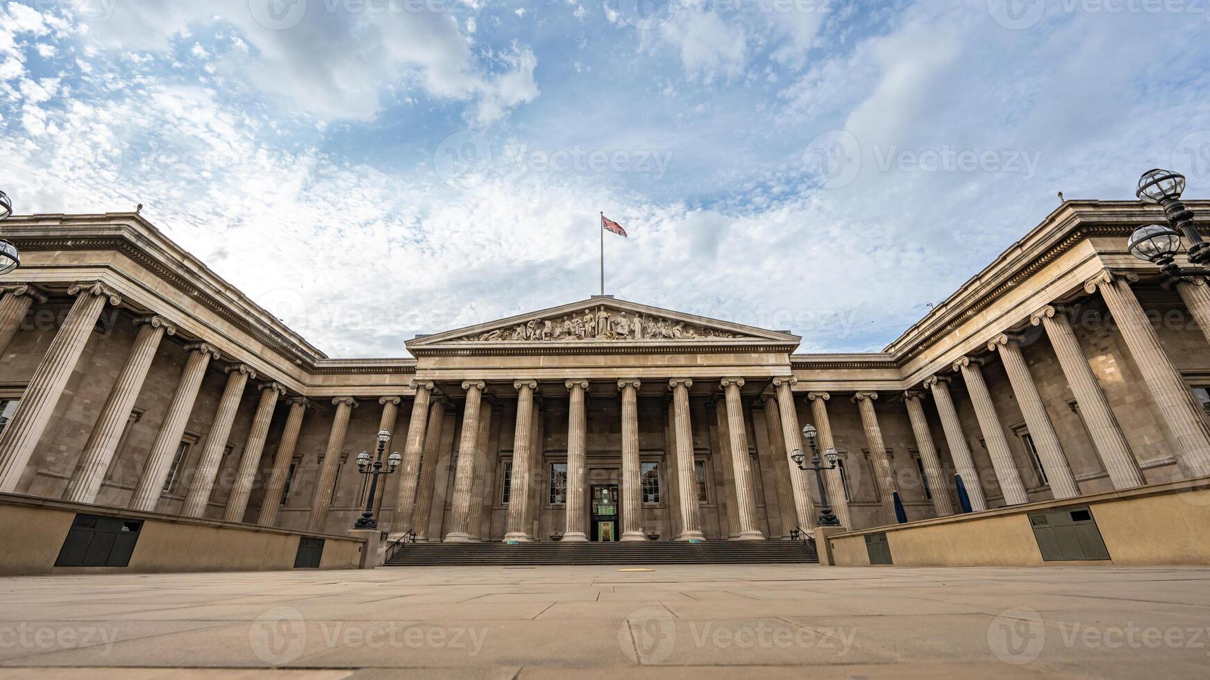 A majestic neoclassical facade with iconic columns defines the British Museum in London photo