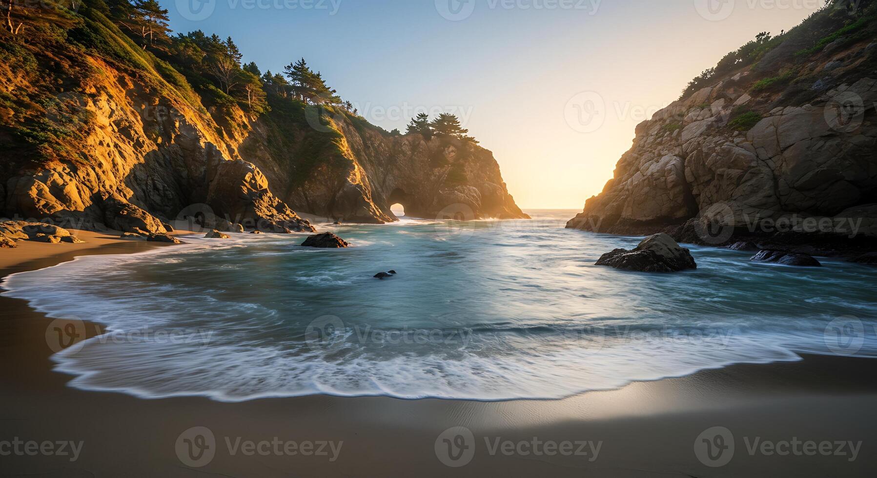 Scenic Beach Coastline with Arch Rock Formation and Crashing Ocean Waves photo