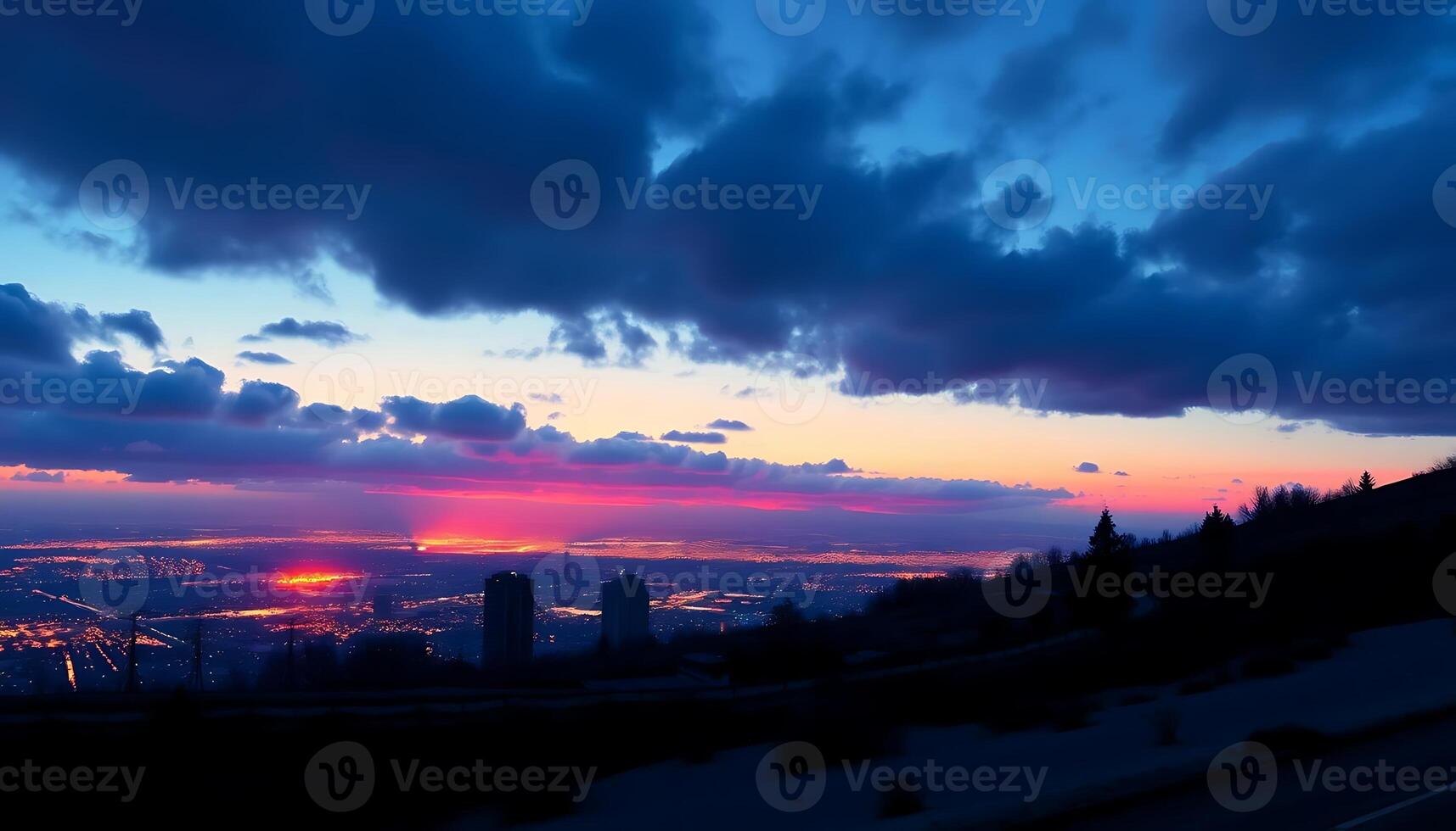 Stunning Sunset Over Cityscape with Dramatic Clouds and Vibrant Colors photo
