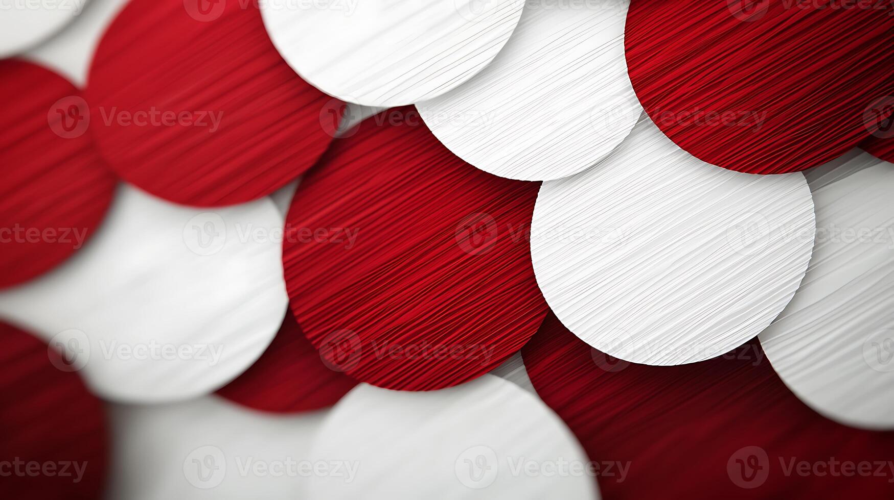 Close-up of textured red and white circular patterns creating a vibrant visual effect photo