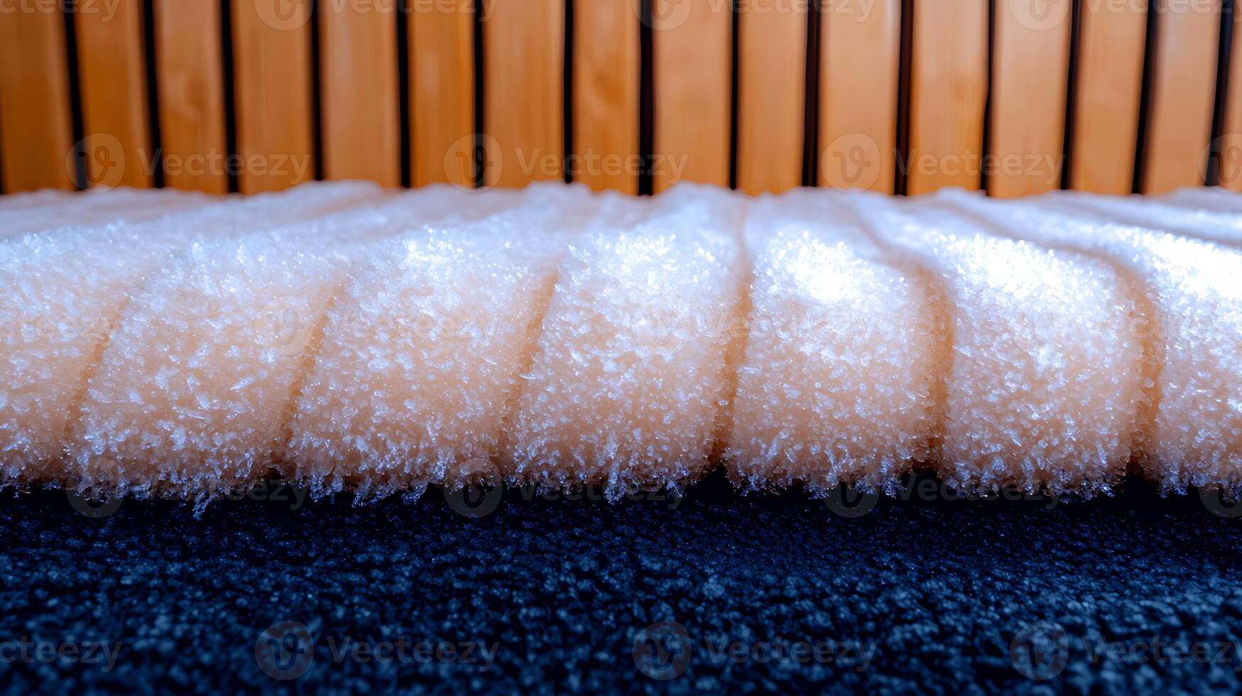Close-up of textured foam with frost in a cozy indoor setting with wooden backdrop photo