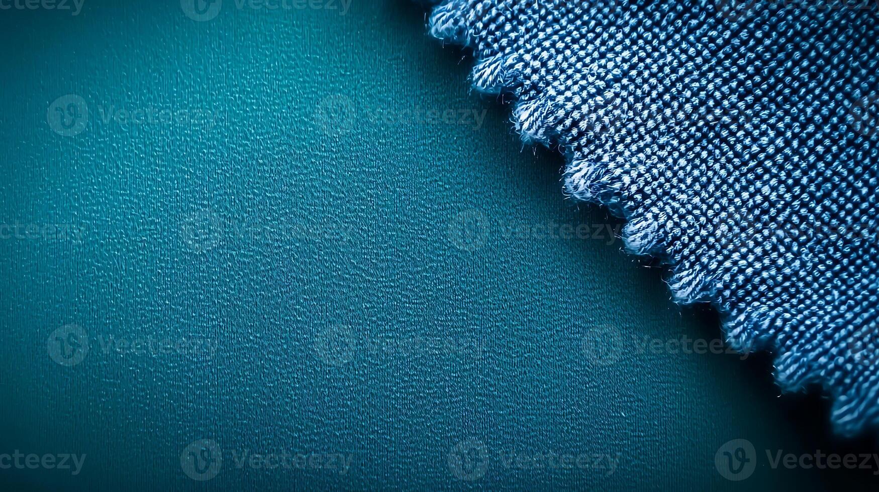 Close-up of textured fabric edge against a smooth surface, showcasing color contrast and detail photo