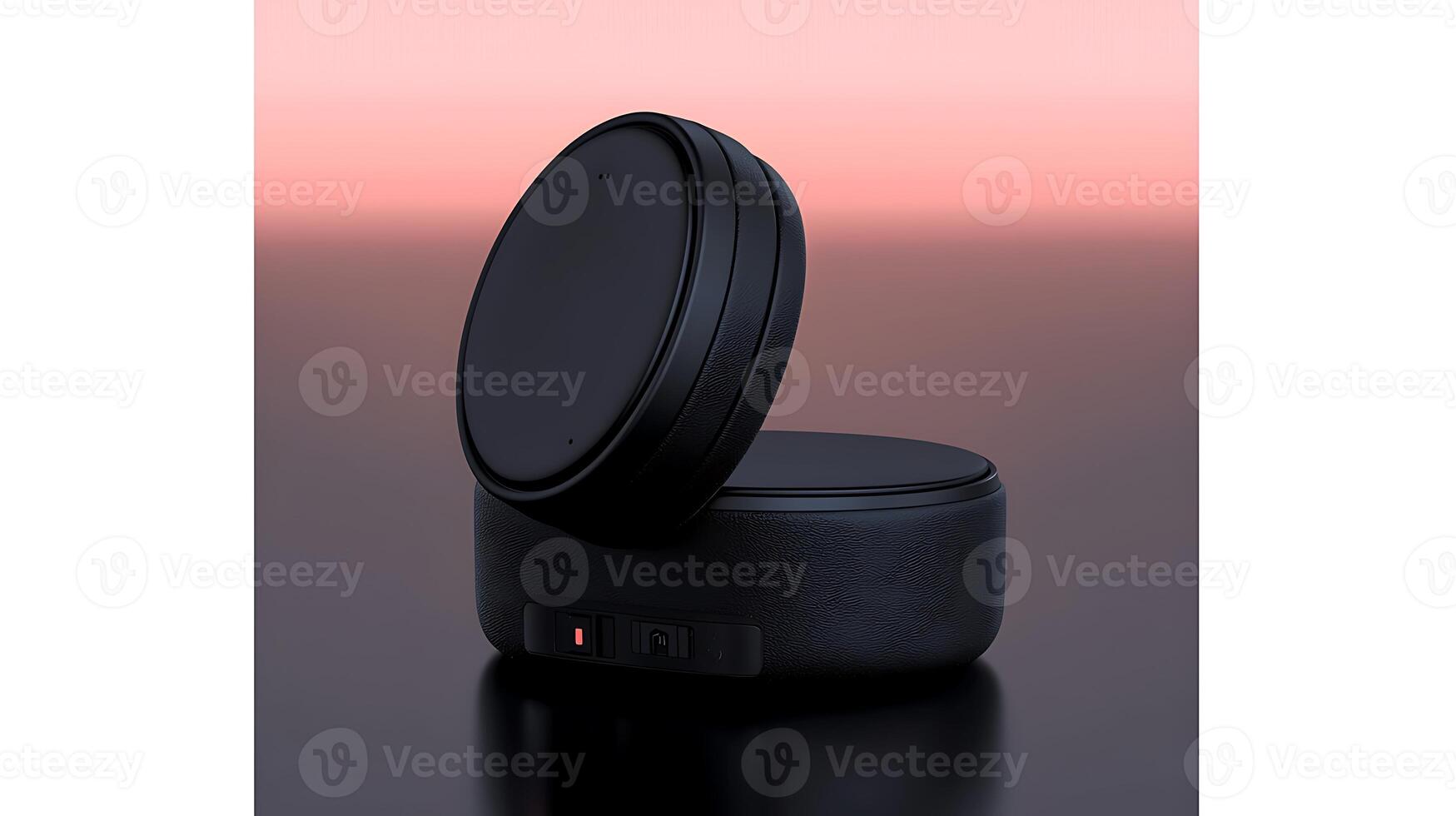 Sleek black audio device with a lid open, set against a soft gradient background photo