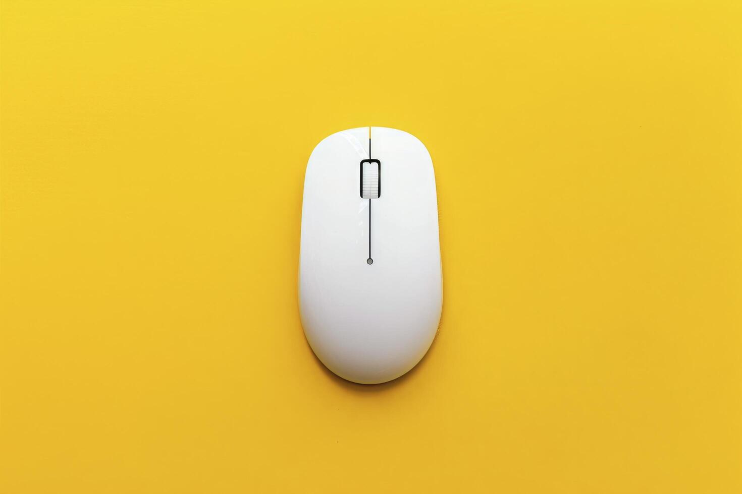 A white computer mouse on a yellow background photo