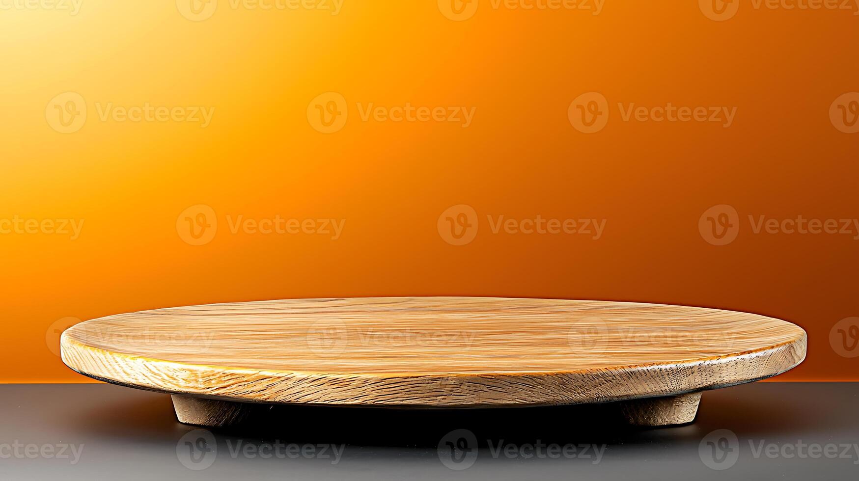 Wooden display platform on a smooth surface with a vibrant orange gradient background photo