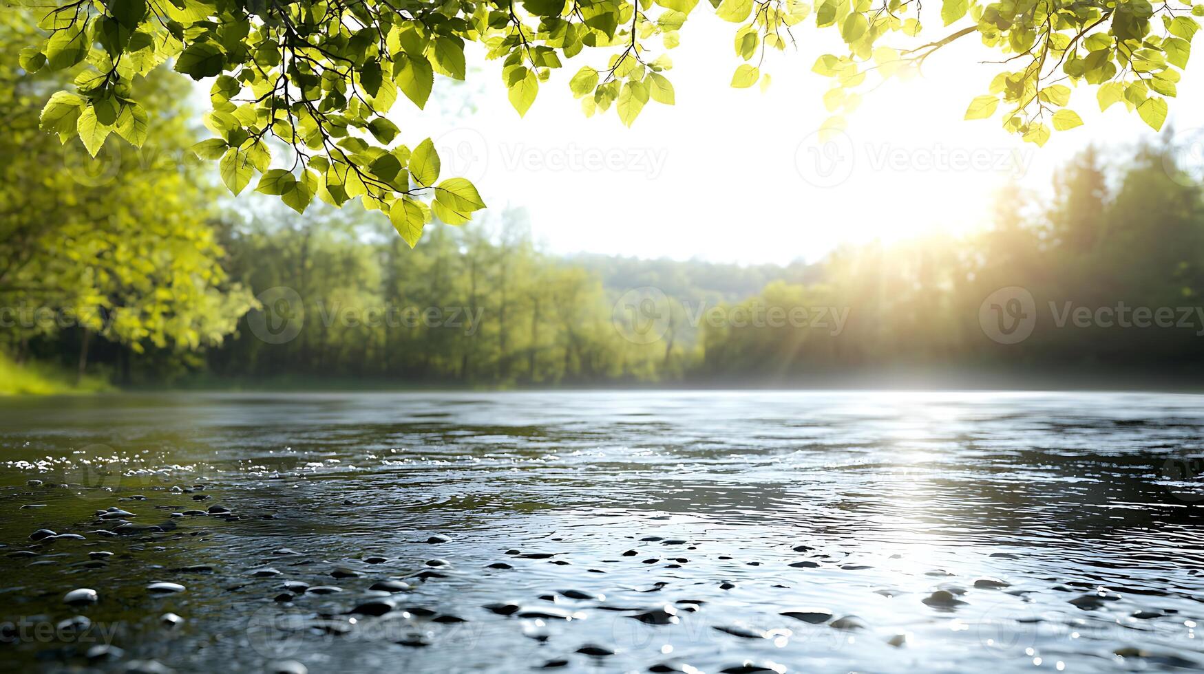 Serene lakeside view at sunrise with gentle ripples and lush greenery surrounding the water photo