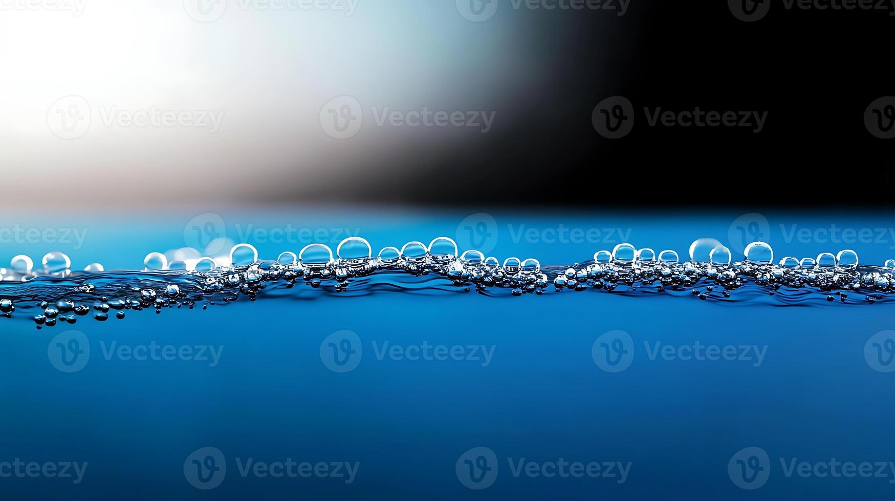 Close-up of water droplets on a smooth surface with a blurred background, evoking tranquility photo