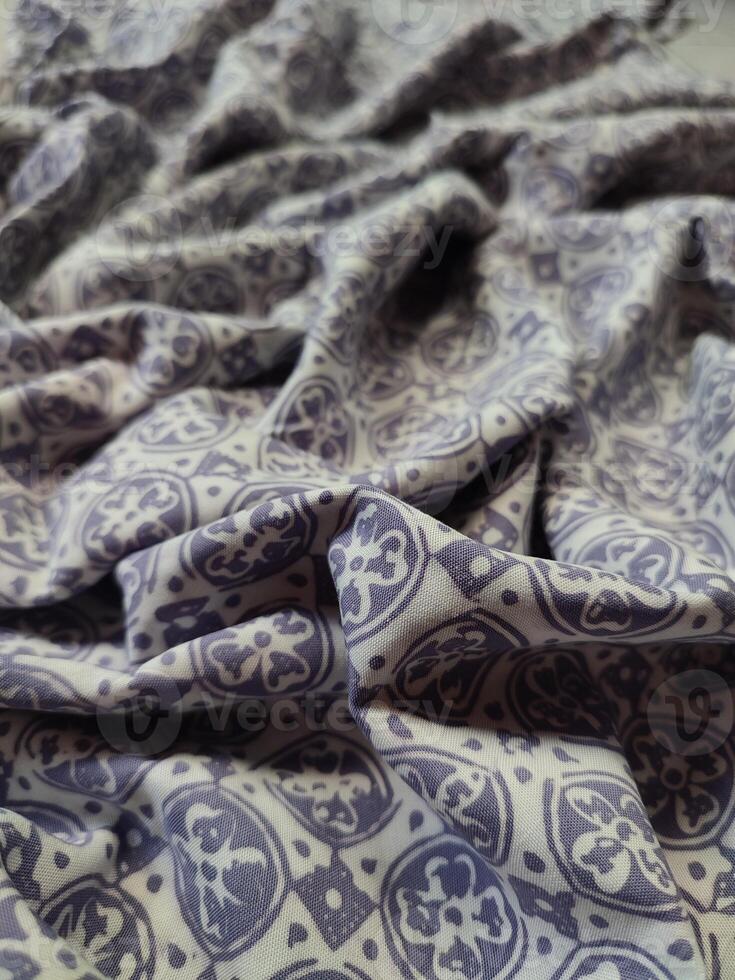 a close up of a purple and white pattern photo
