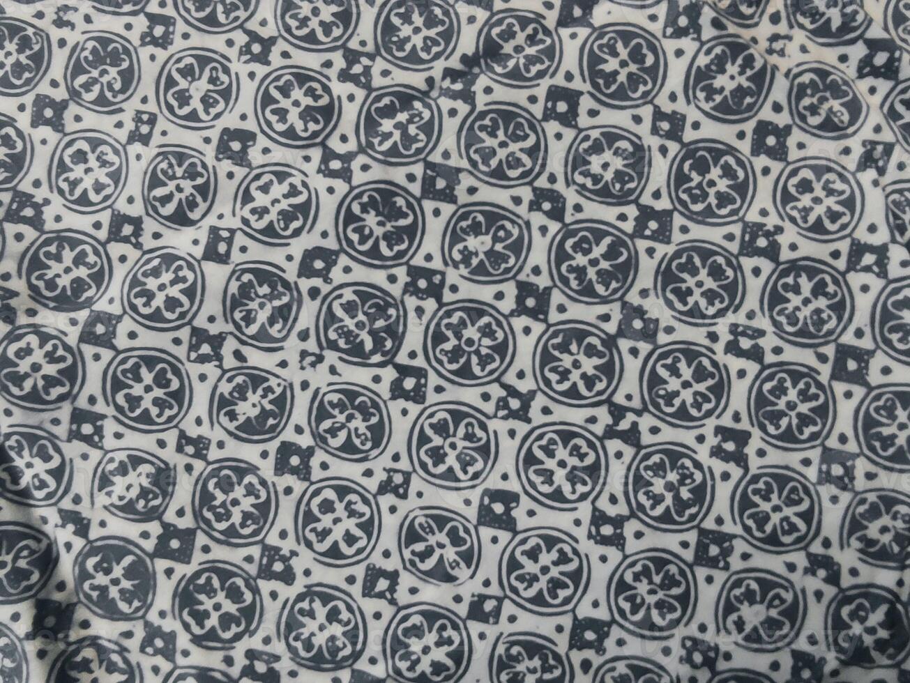 Close up of a blue and white pattern fabric photo