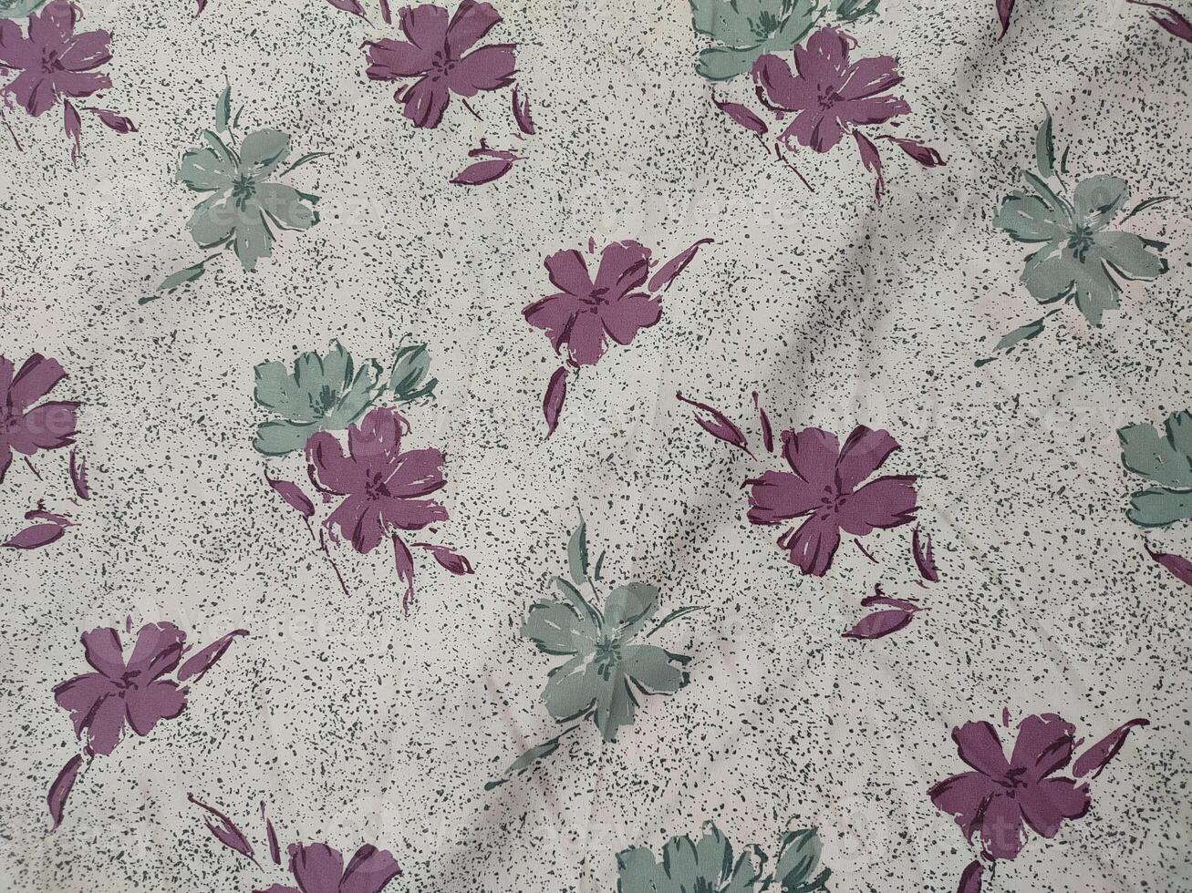Seamless floral fabric pattern motifs and background with summer and autumn flowers photo