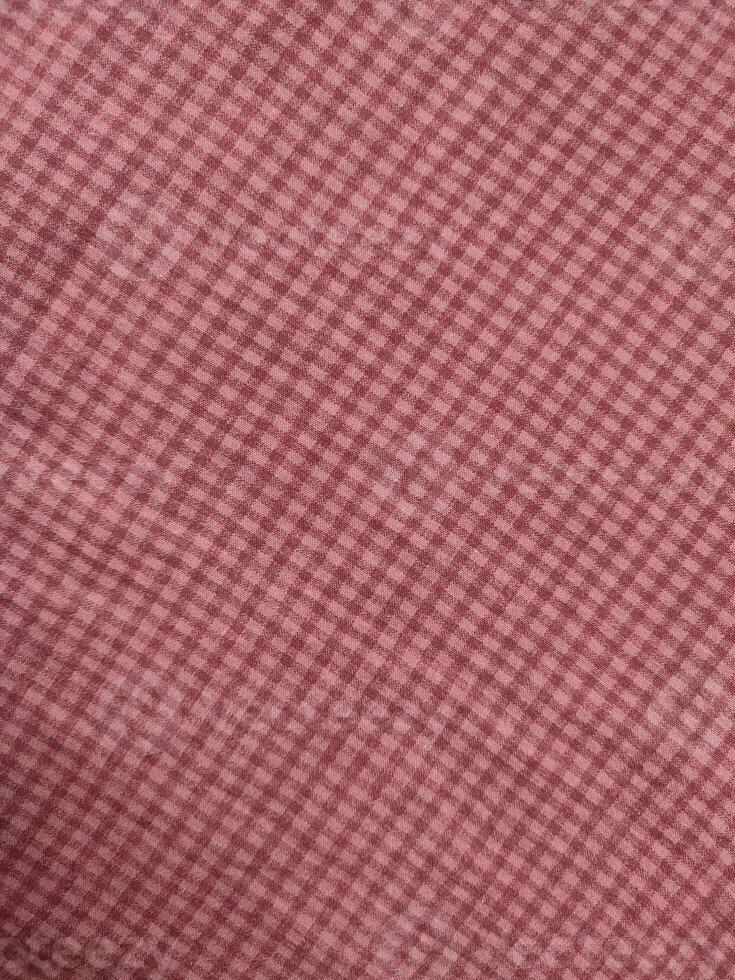 close up of a pink and white checkered fabric photo