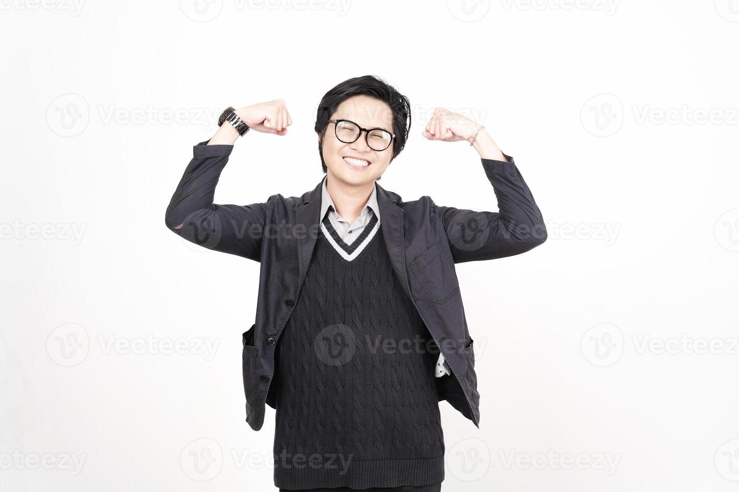 A man with glasses and a sweater is posing photo
