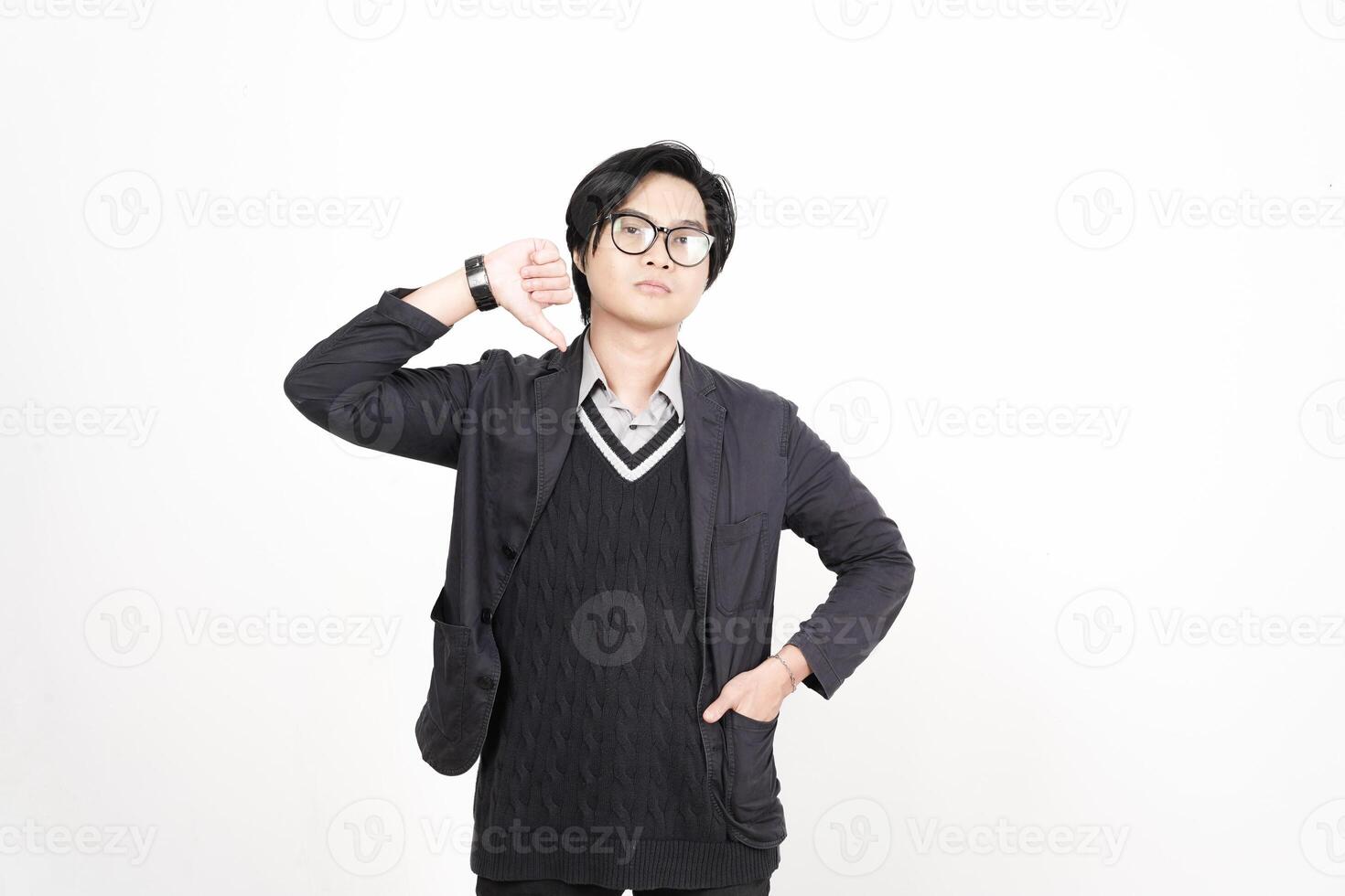 A man in glasses and a sweater is posing photo