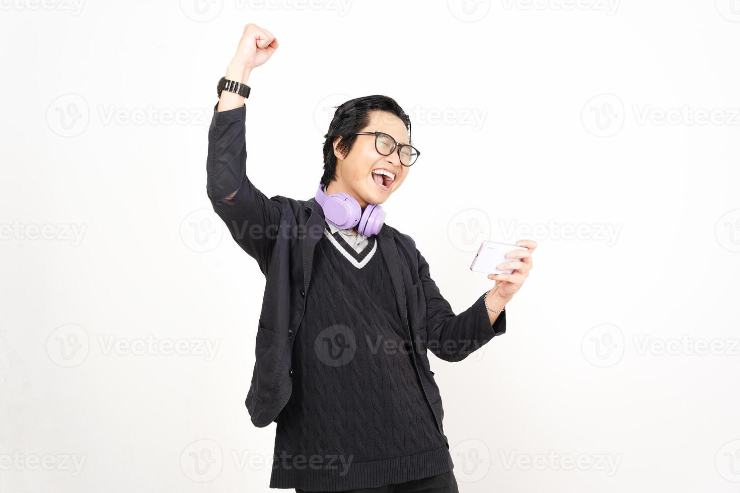 A man in glasses and a sweater is holding a cup photo