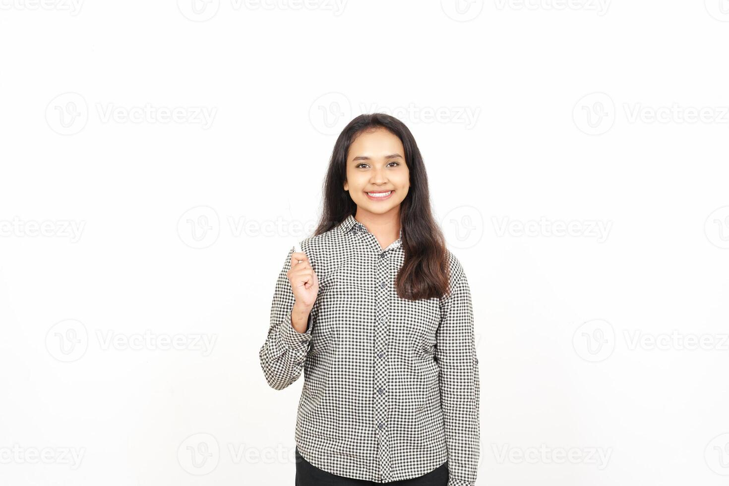 A woman in a shirt and pants standing in front of a white background photo