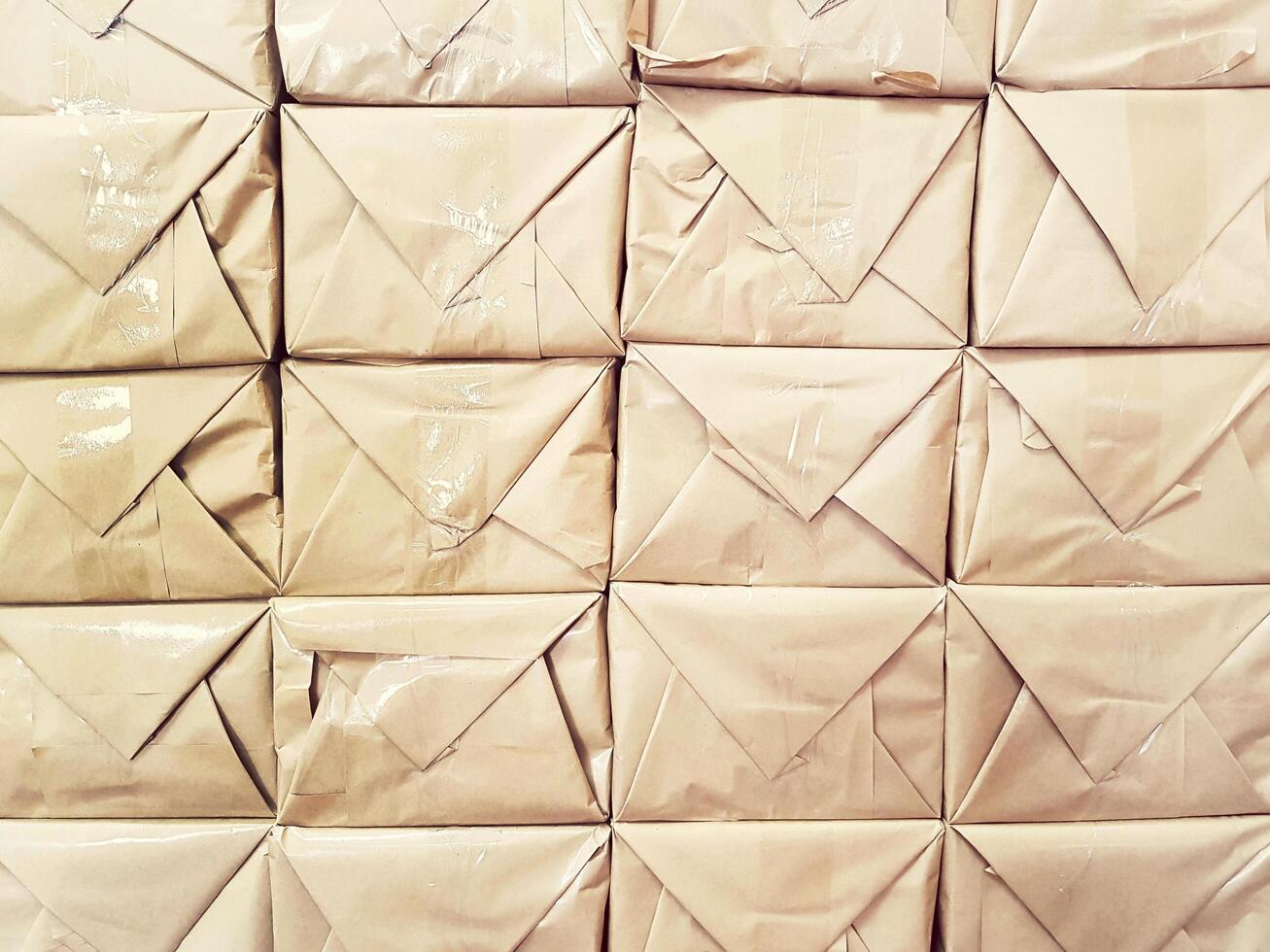 Many stack of brown package boxes. Packaging store for business book store or background concept. photo