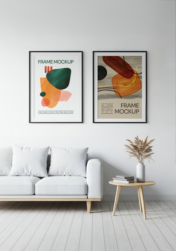 A minimalist living room features a white couch and two abstract art pieces psd