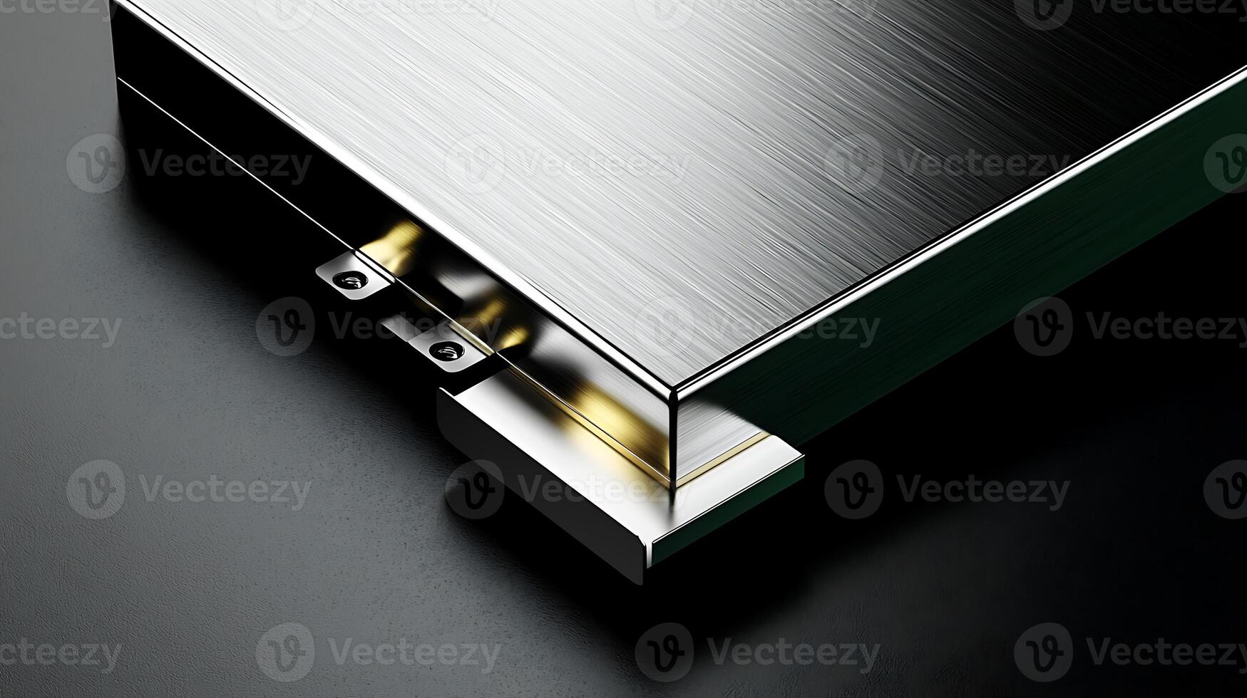 Close-up of a sleek, modern metallic edge with intricate detailing against a dark background photo